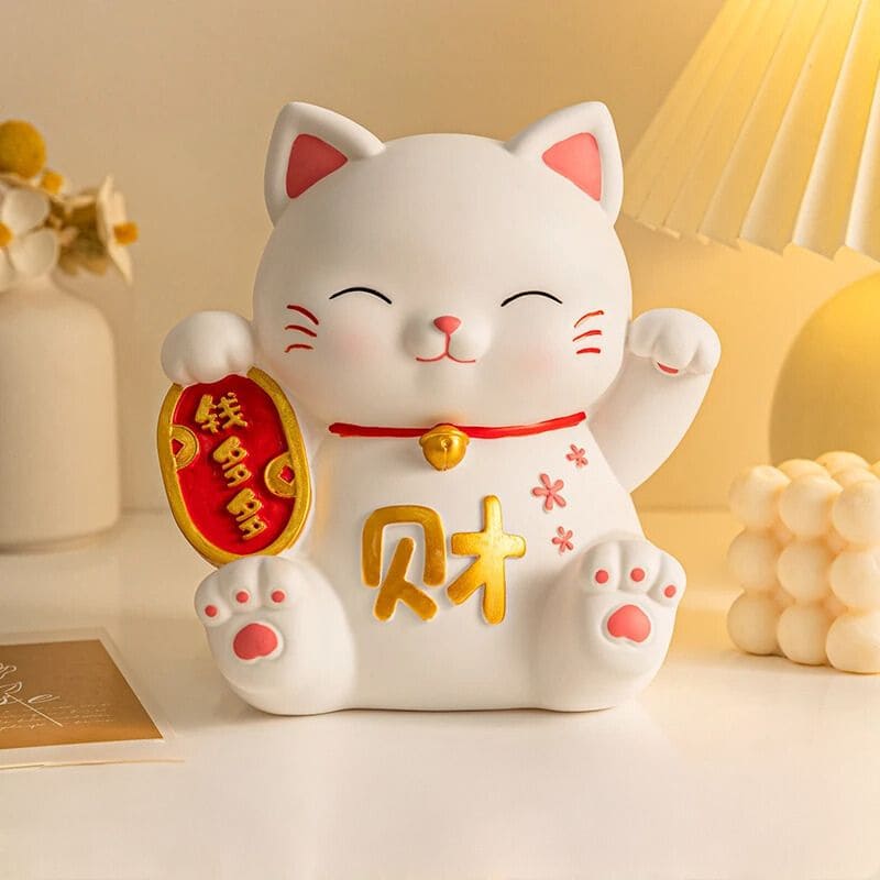 tirelire chat qui tend la patte