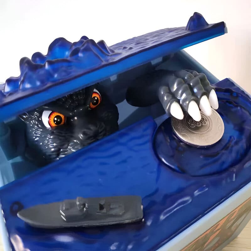 tirelire godzilla qui vole la piece