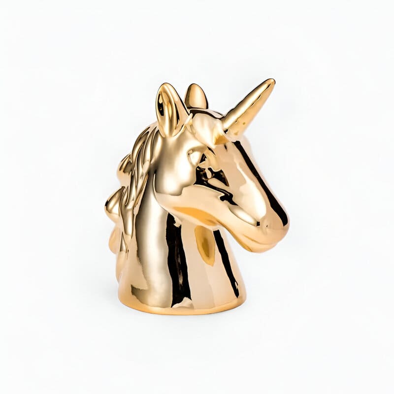 tirelire dorée en forme de licorne